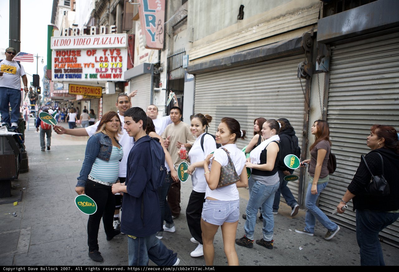 Great American Boycott Protesters Walk Down Sidewalk