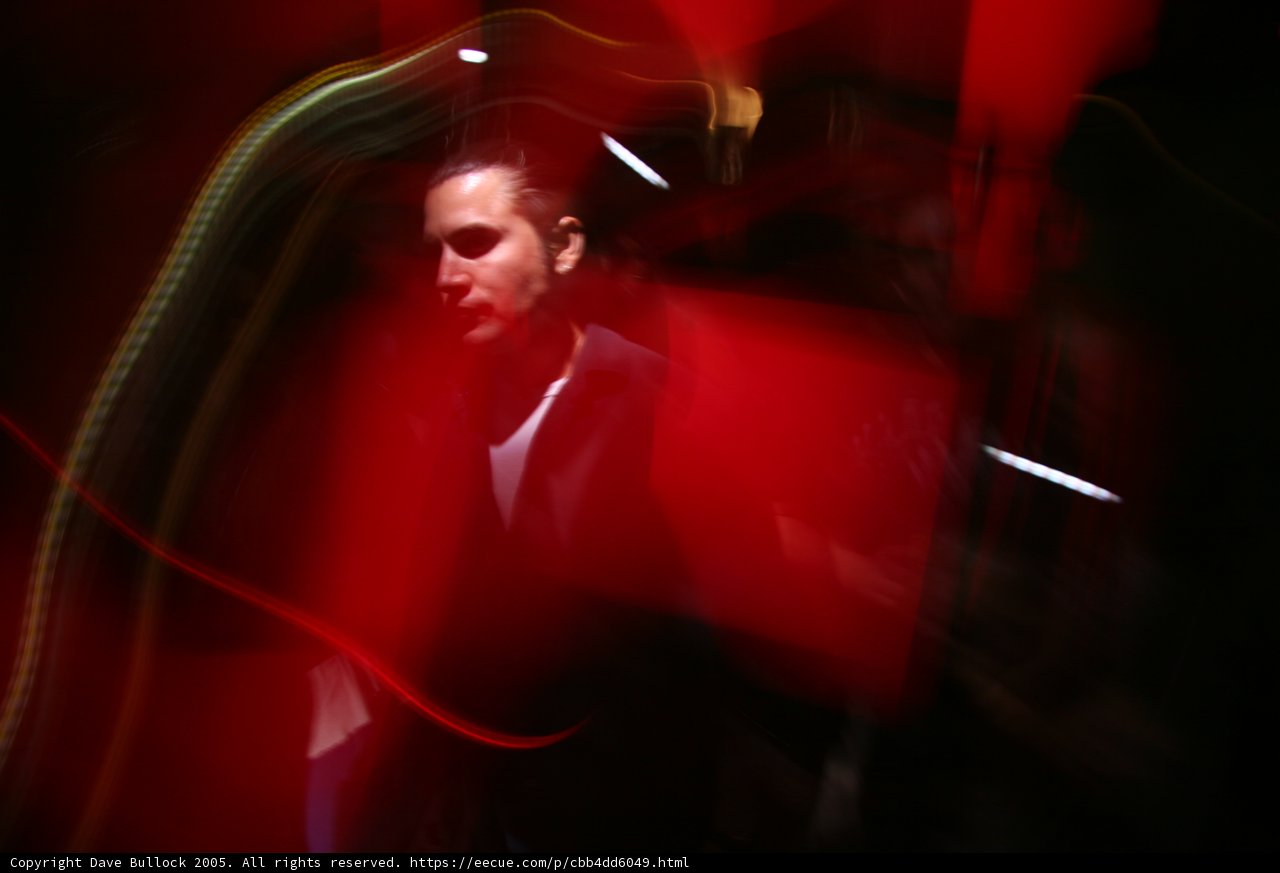 The Blurred Red Suit