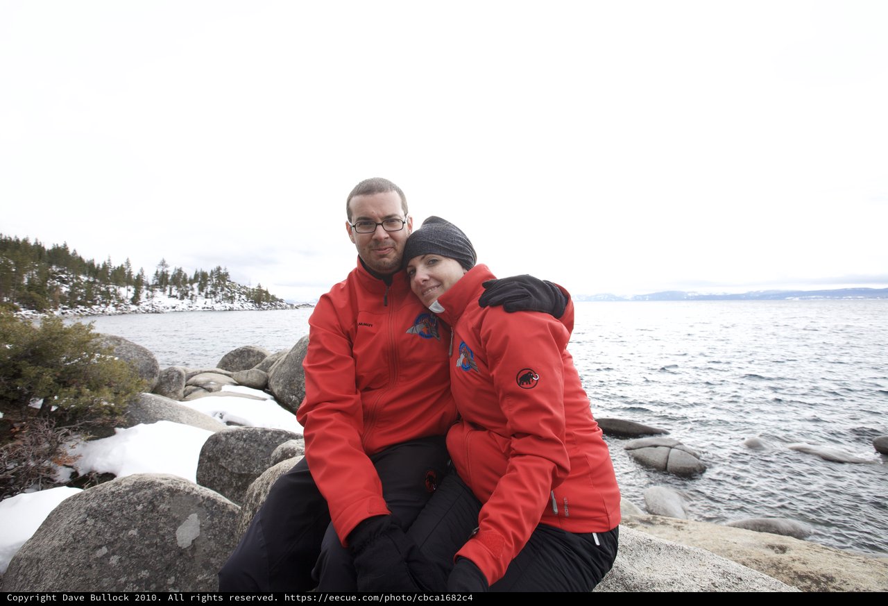 Couple Embracing at Winter Lake Tahoe Shoreline