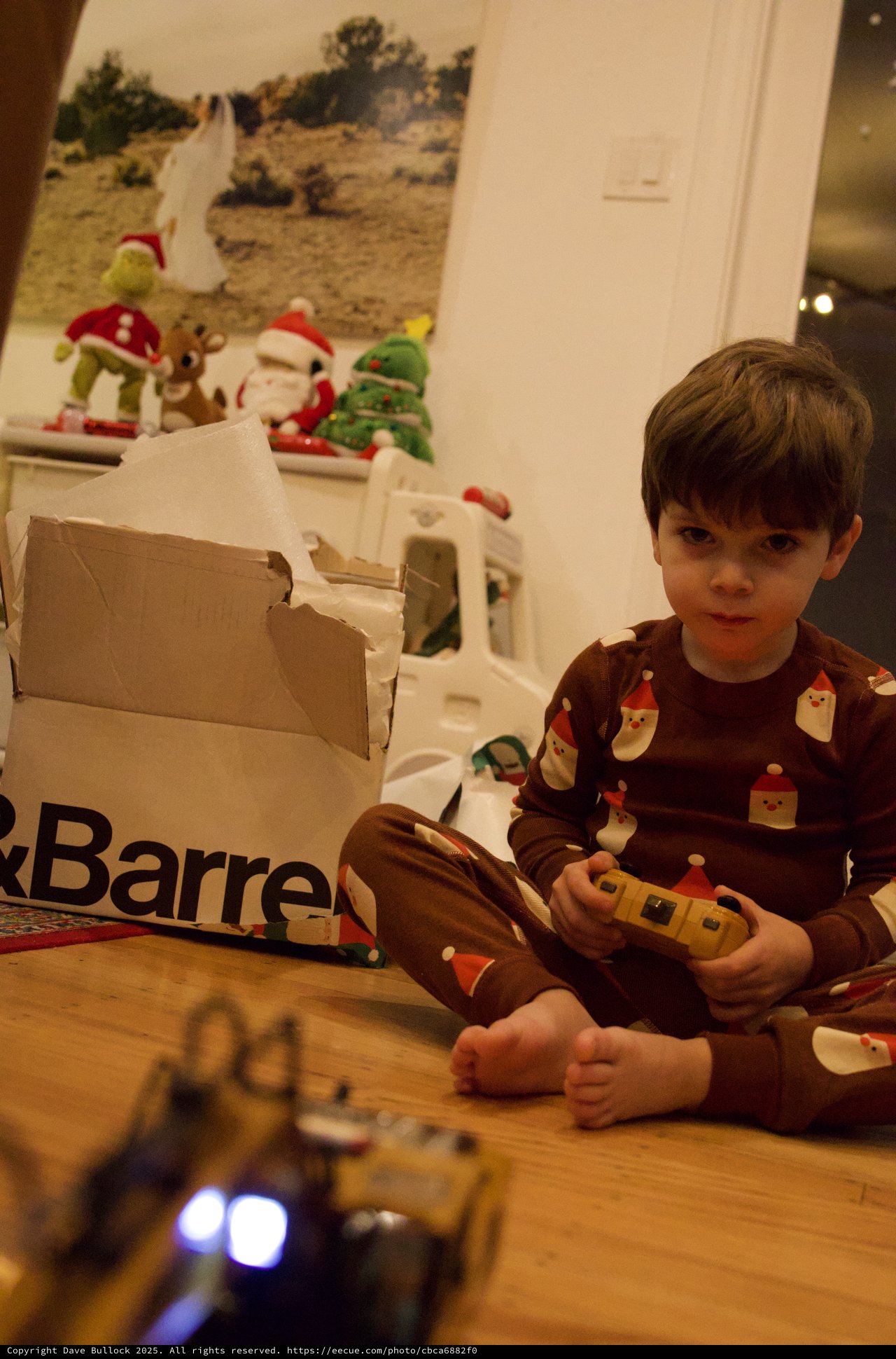 Boy Playing with Remote Control Toy on Christmas Morning