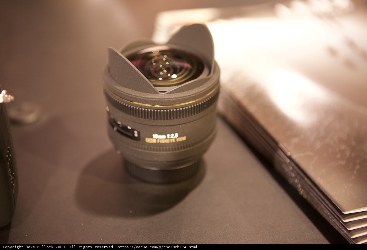 A Close-Up of Camera Lens on Table