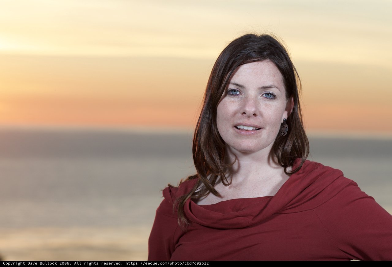 Woman in Red at Golden Hour Seaside