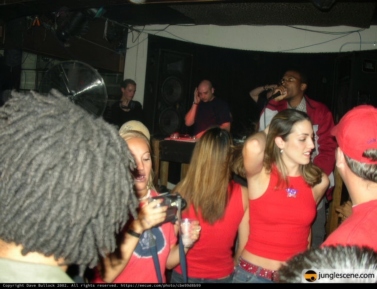 Nightclub Fun with Red Shirts and Black Pants