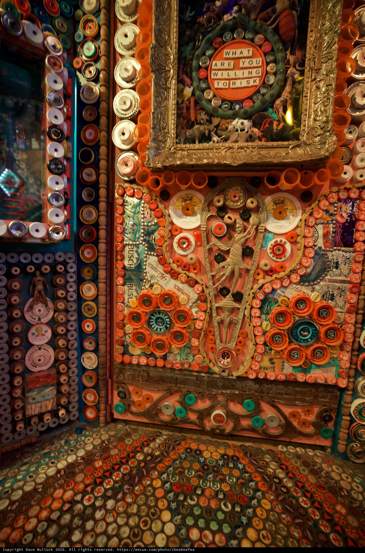 Intricate Folk Art Installation with Buttons and Found Objects