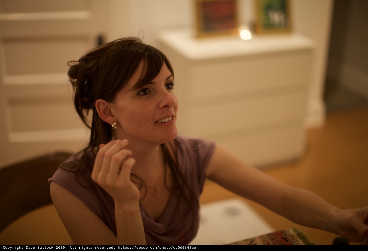 Thoughtful Woman in Warm Gallery Evening Light