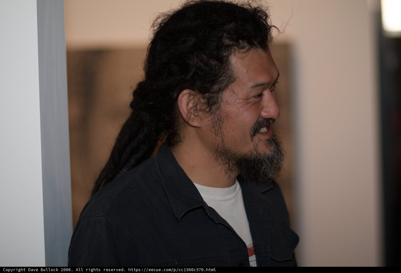 Smiling Man with Dreadlocks and Beard