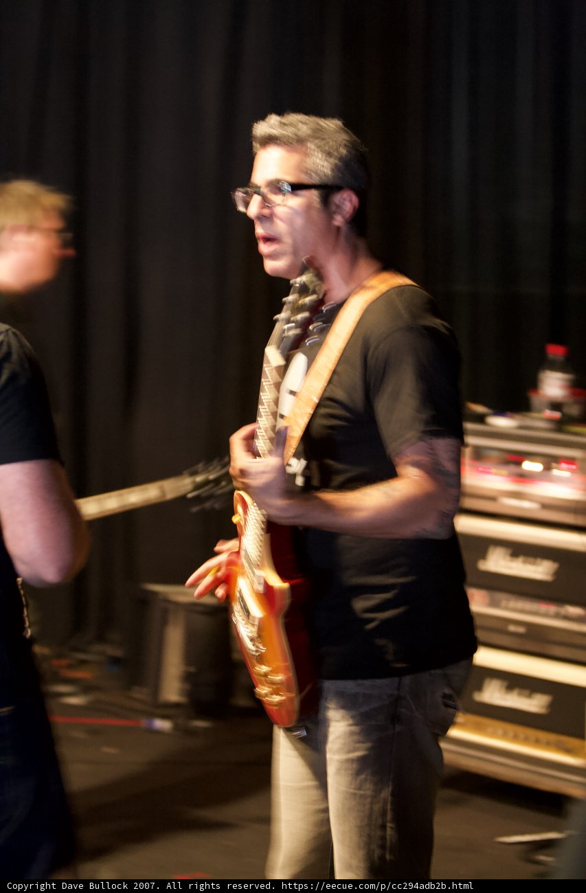 Brett Gurewitz playing the guitar at Glasshouse album release