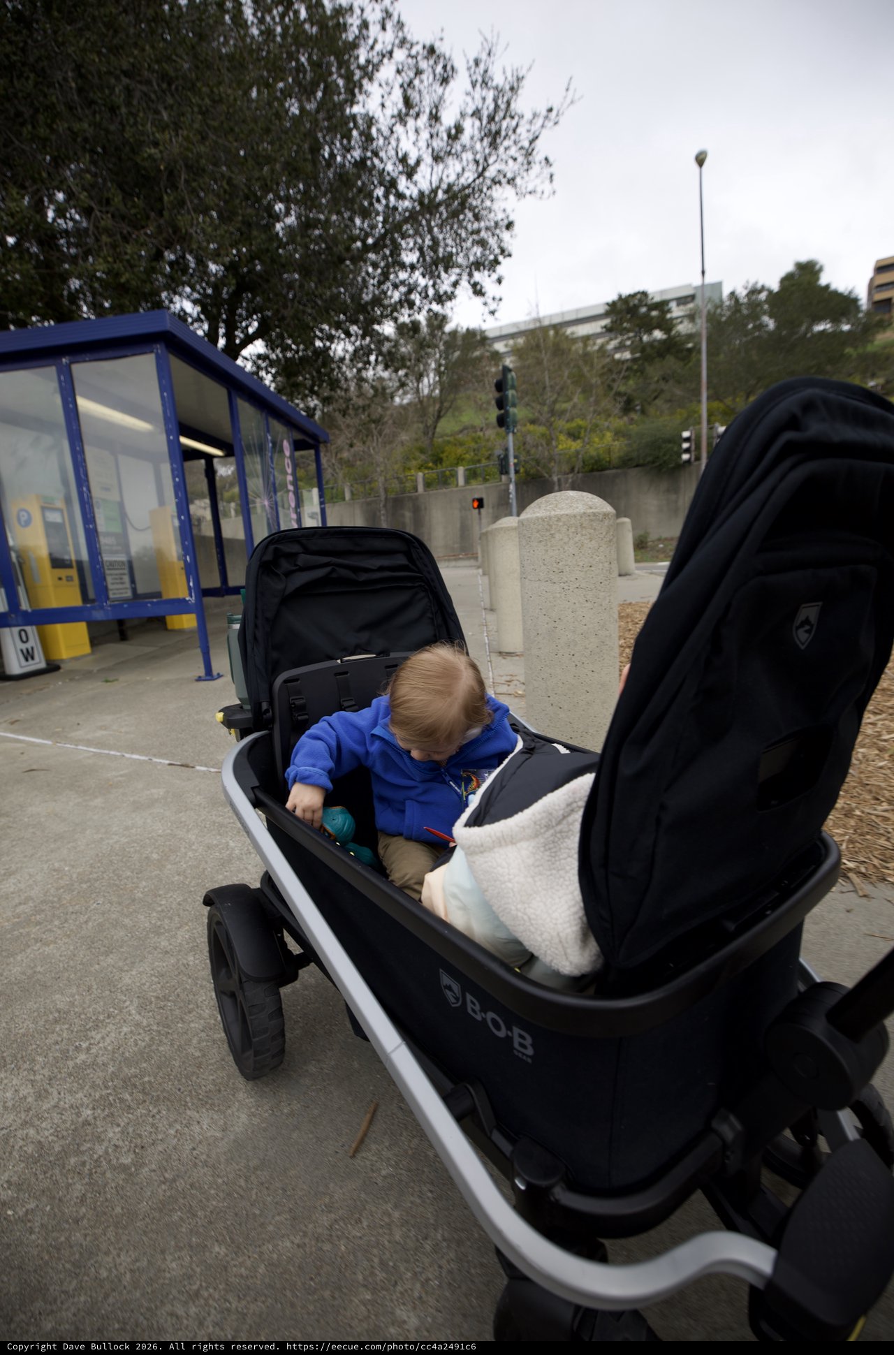 Young Child in Modern BOB Stroller at Transit Station