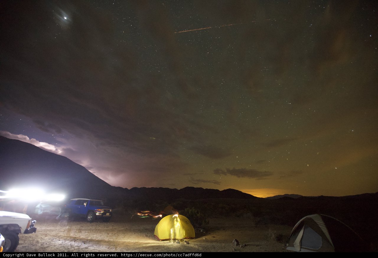 Night Sky Illuminates Mountain Tent