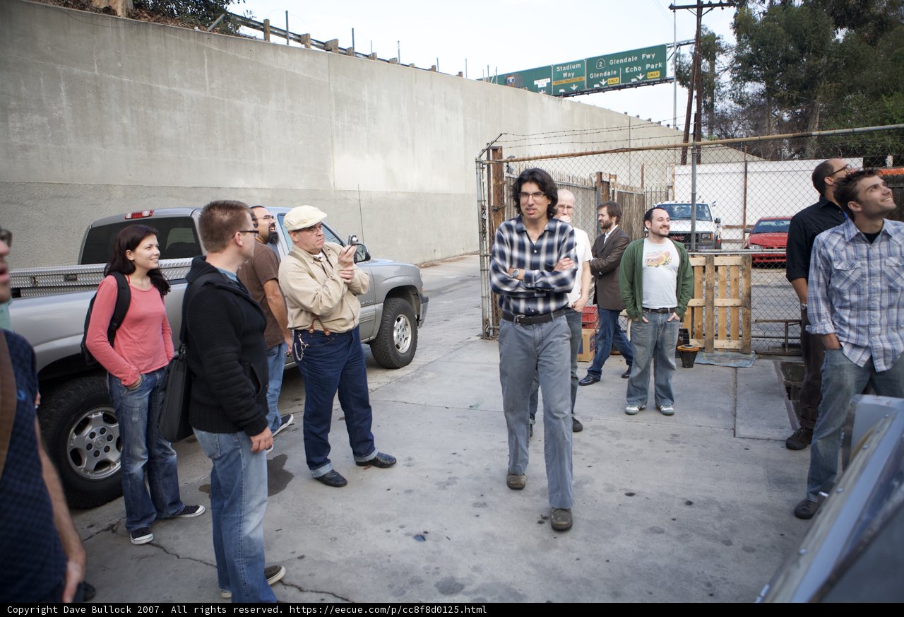 Gathering in Front of an Automobile Building