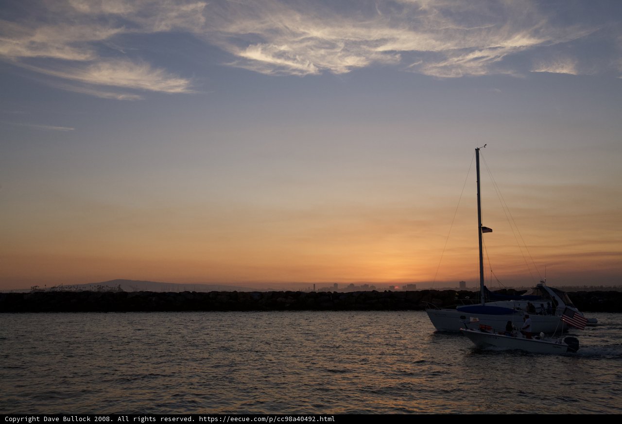 Sailboats on Lake at Sunset