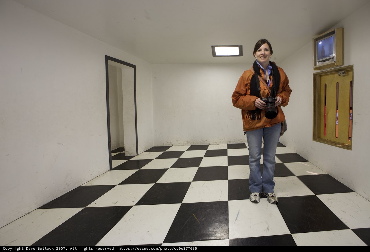 Photographer Poses in Exploratorium's Checkered Room