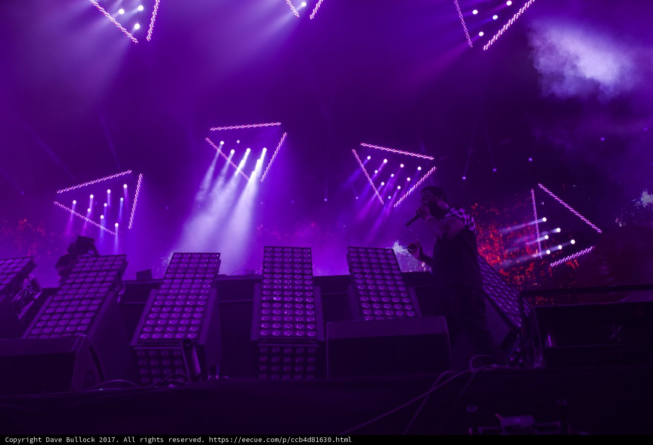 Rocking the Stage with Purple Hues
