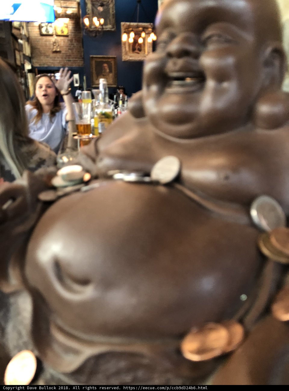 Serene Buddha in a Boozy Setting