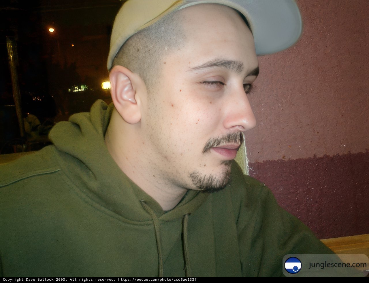 Green Hoodie and Baseball Cap