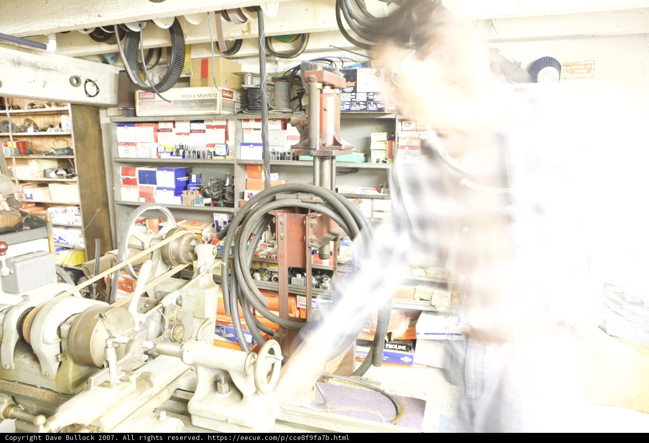 Machine Man in Factory Workshop