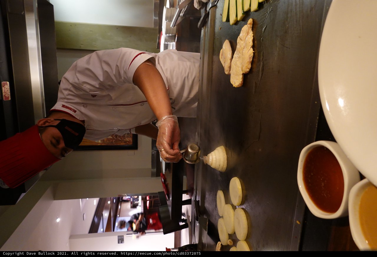 Japanese Hibachi Chef Preparing Teppanyaki Dinner