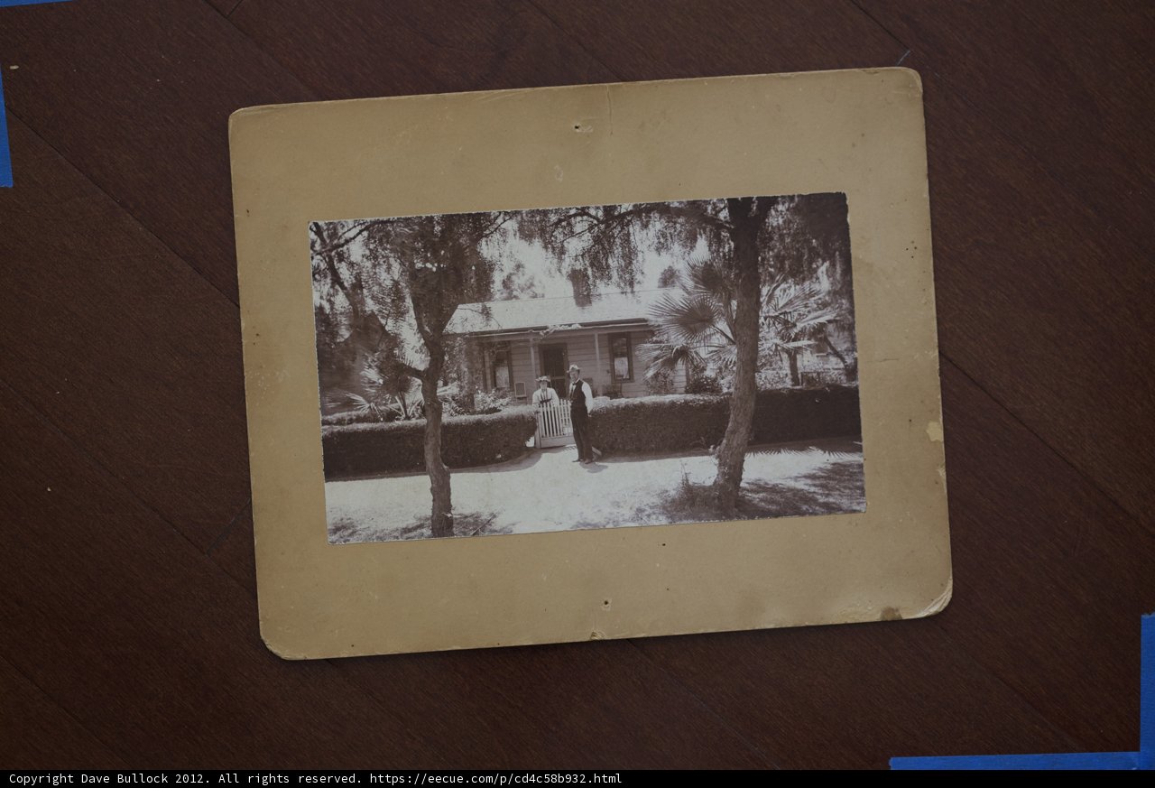 Allyn and Joslyn in Front of their Wood Cottage