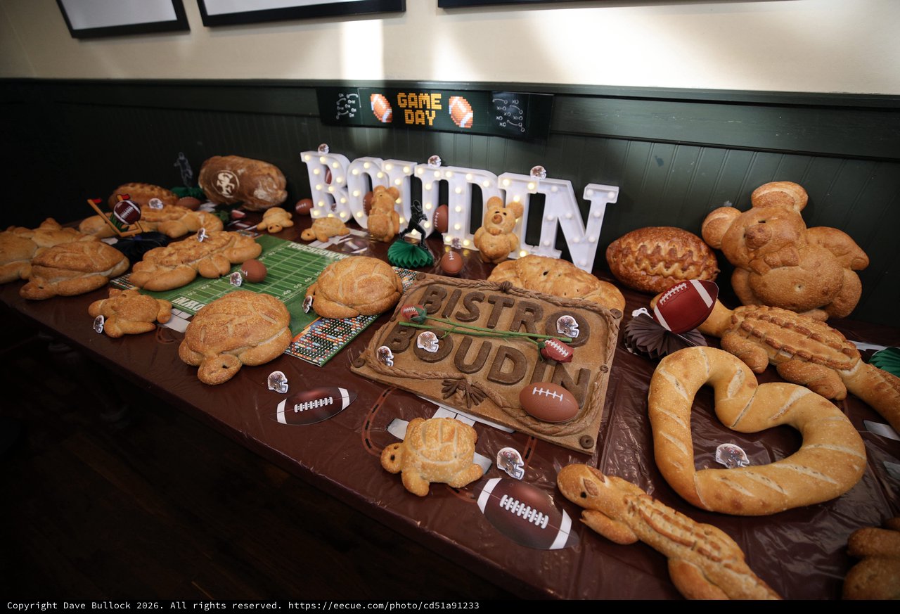 Game Day Football-Themed Bread Display with Illuminated Signage