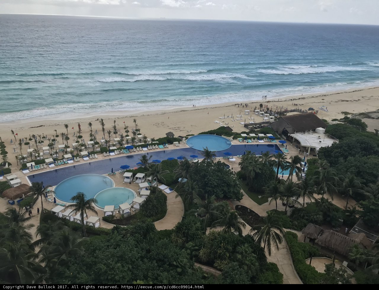 Aerial View of Luxurious Resort Pool and Beach