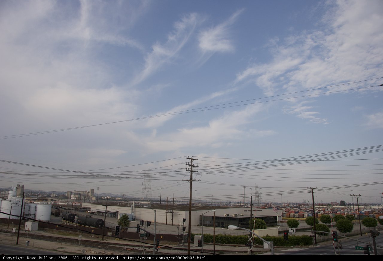 Urban Metropolis With Power Lines and Blue Sky