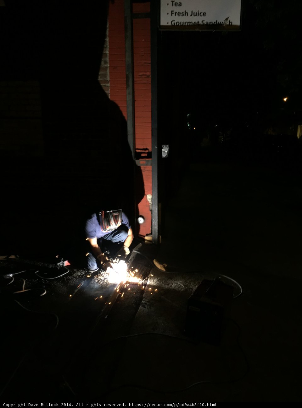 Welding on the Sidewalk at Night