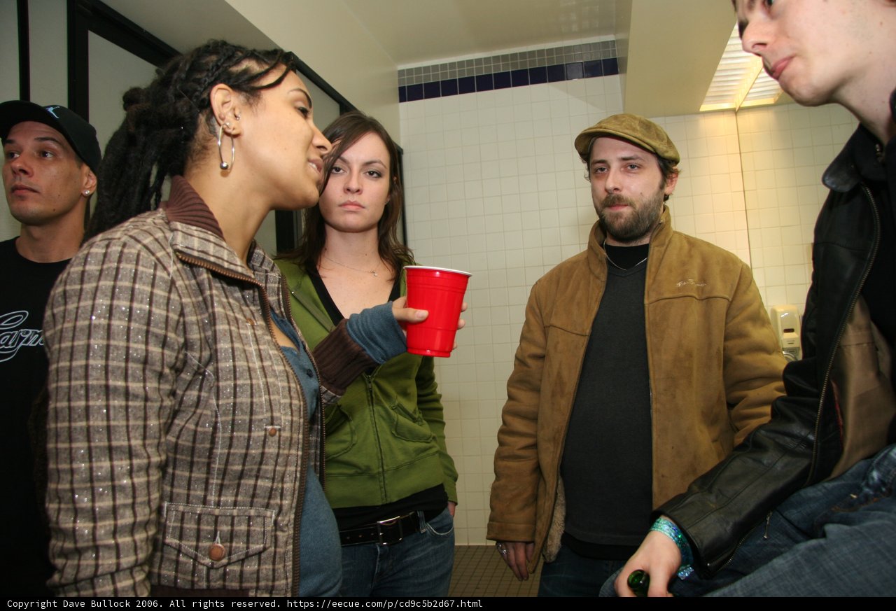 Brown Jacketed Woman at New Year's Eve Party