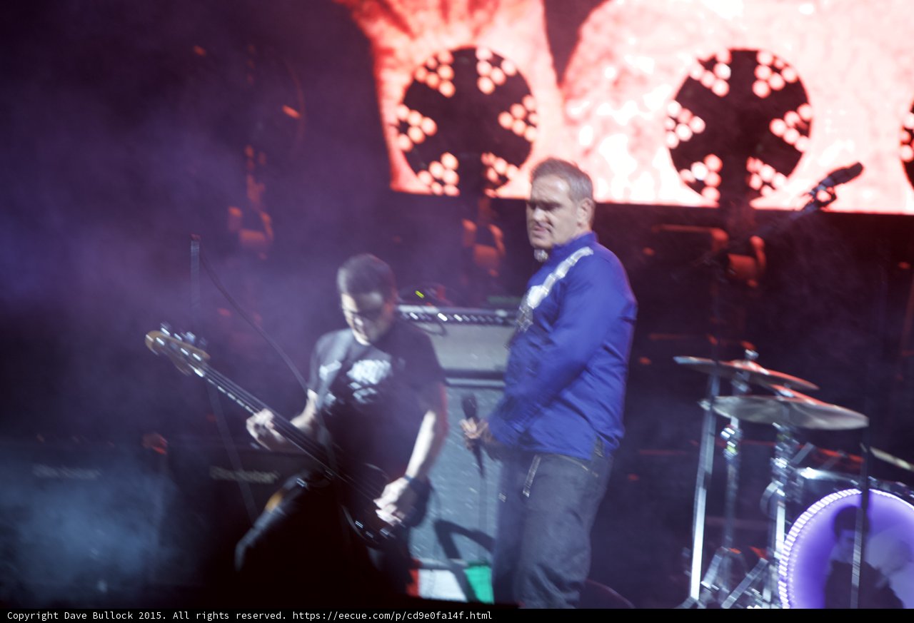 Morrissey Profile Blue Shirt Bassist Motion Blur Drums LED Head Red Video Screen Purple Haze