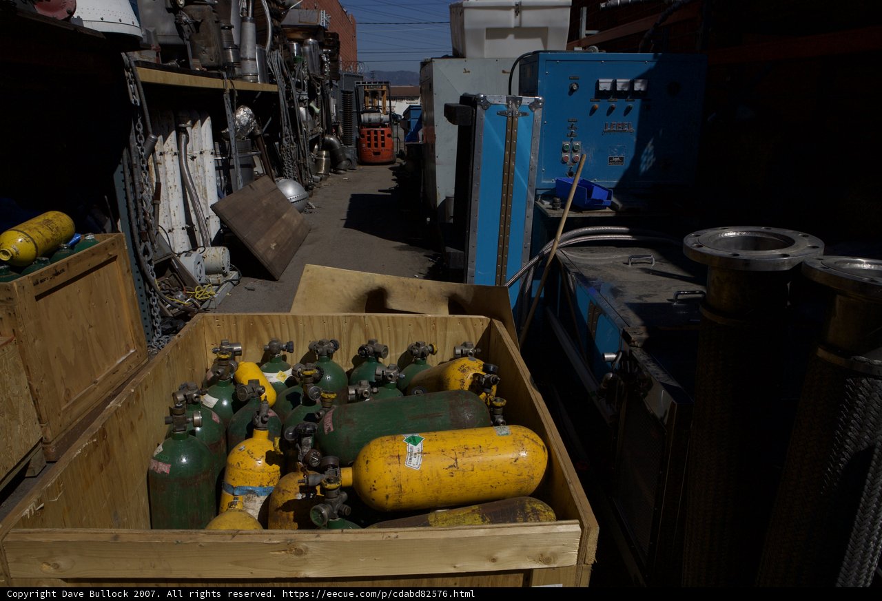 Crate of Colorful Gas Tanks at Norton Sales