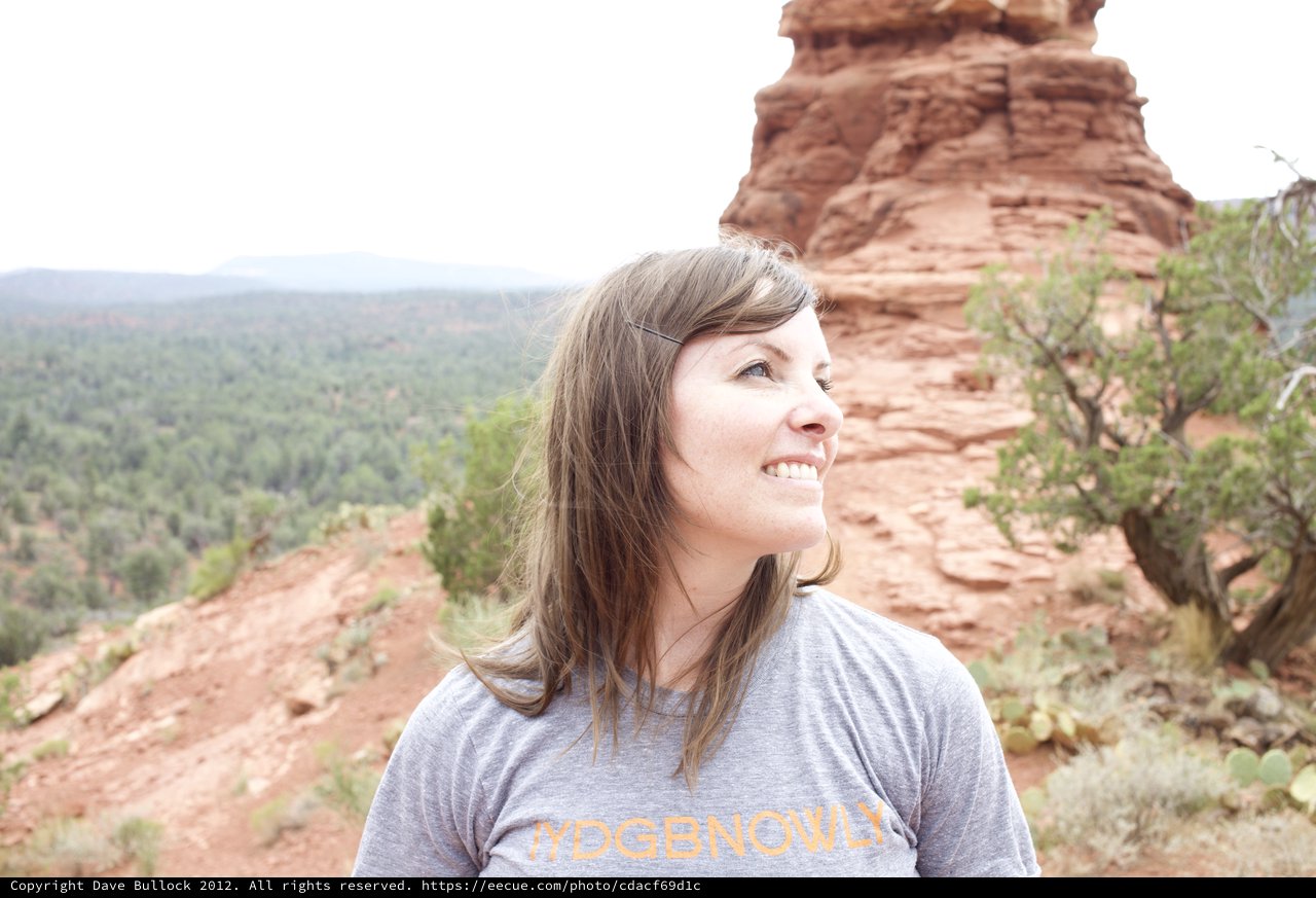 Woman Smiling Amid Sedona Red Rock Formations