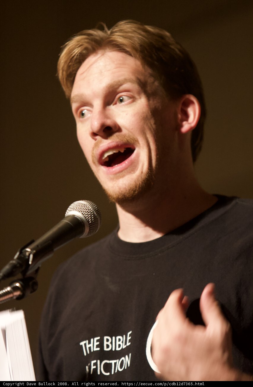 Entertainer Captivating the Crowd with a Microphone