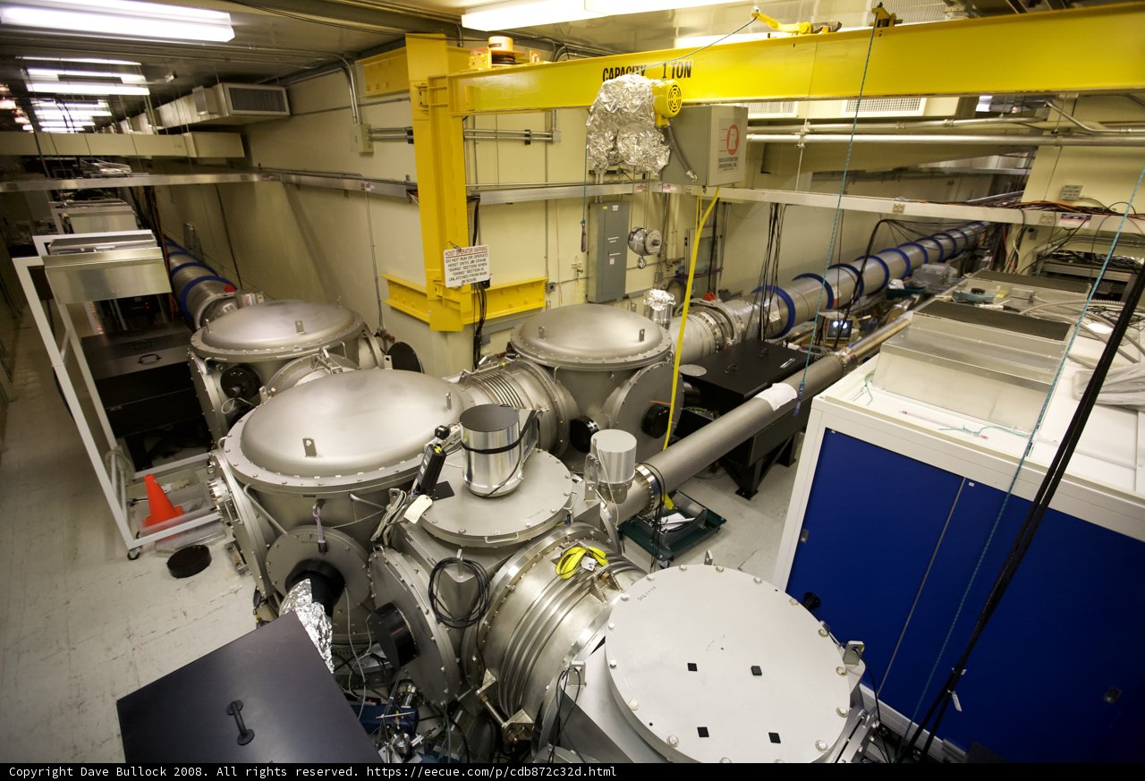 Inside the Factory: A Room Full of Large Metal Tanks and Pipes