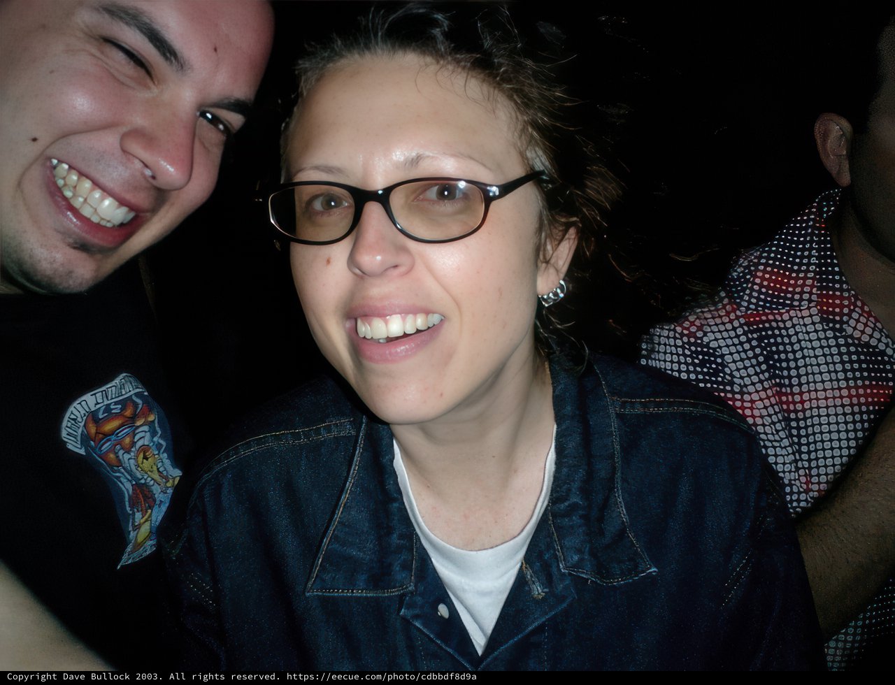 Smiling Duo With Stylish Glasses