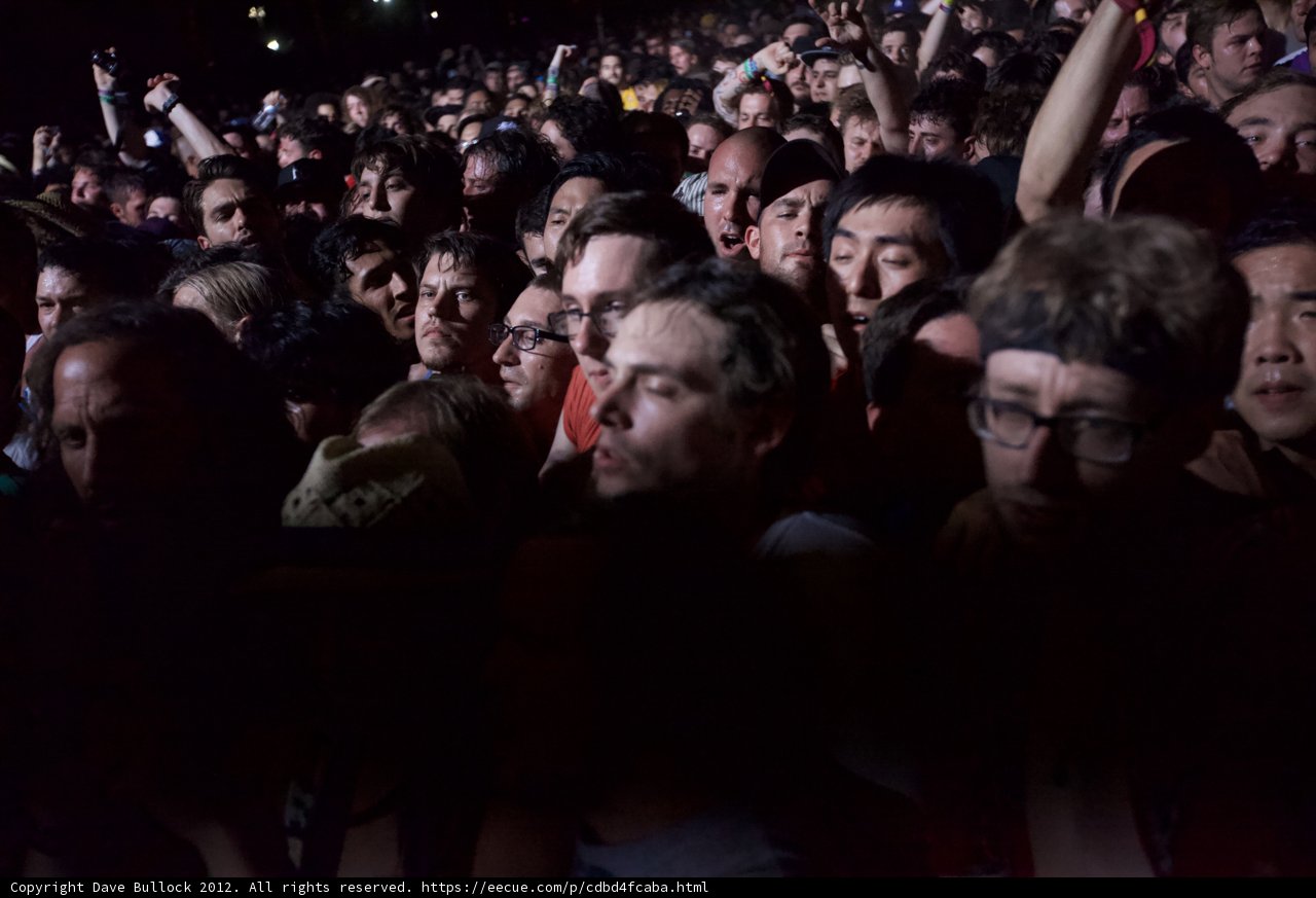 Cell Phone Light in a Sea of Faces