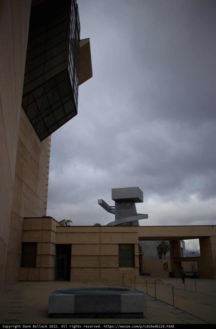 Iconic Sculpture atop Modern Office Building