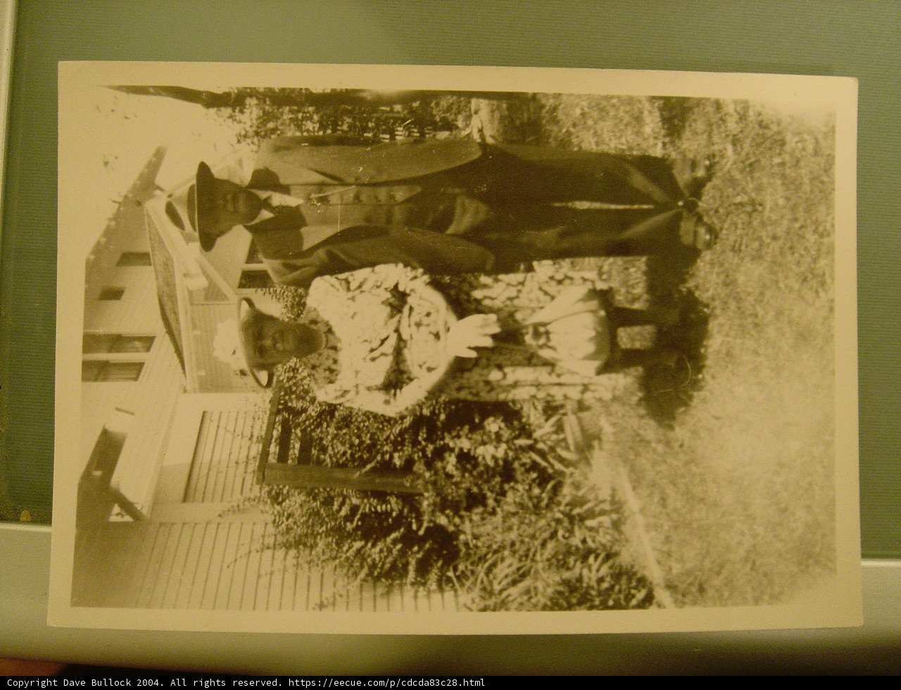Couple in front of a painted house