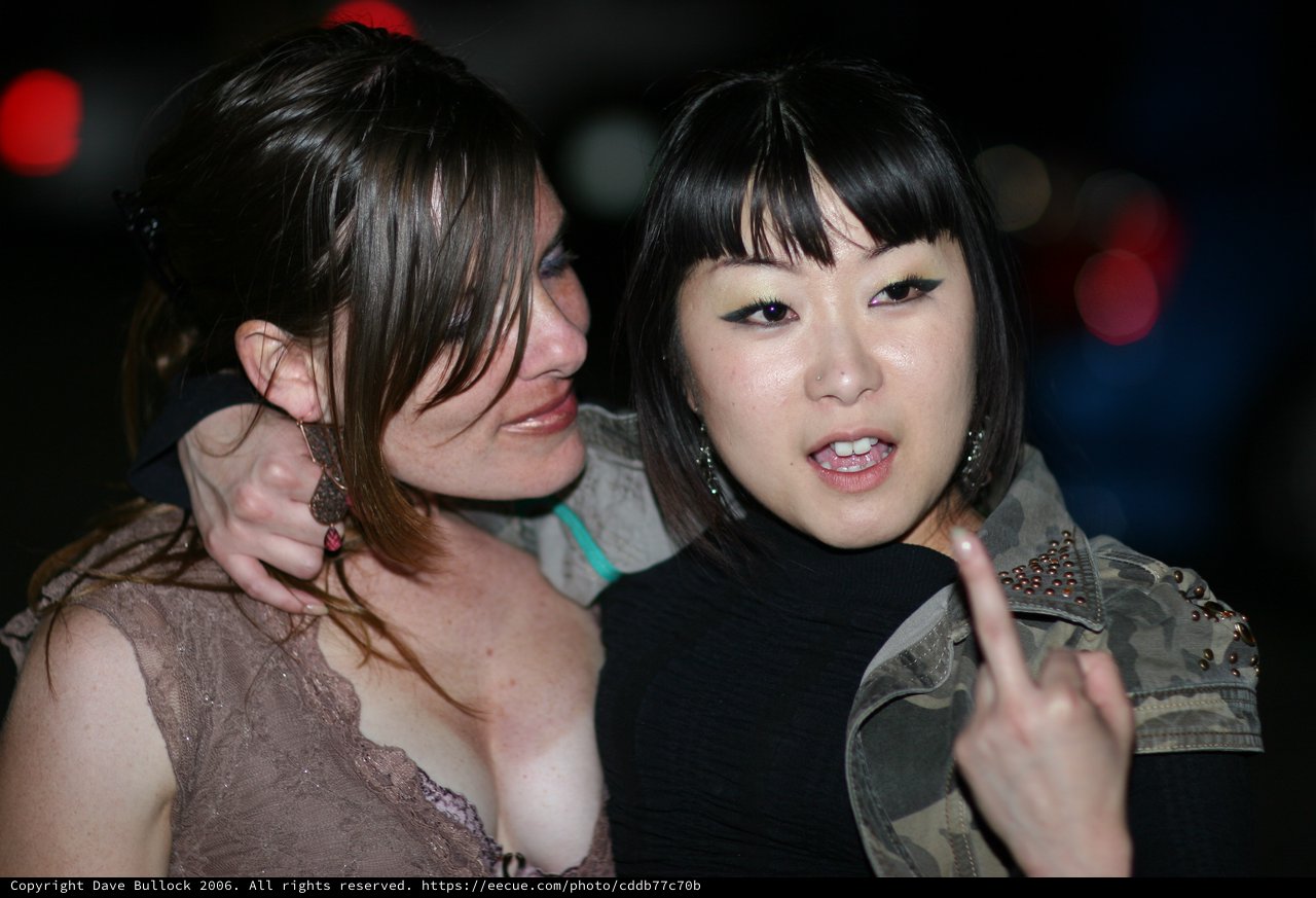 Two Friends Celebrating at Nighttime Event 2006