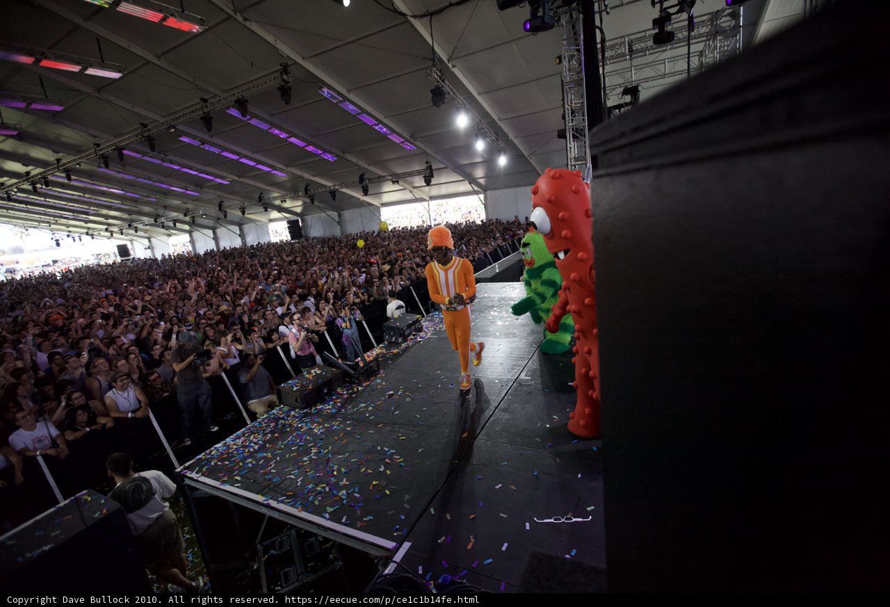 Orange Man on Stage with Confetti
