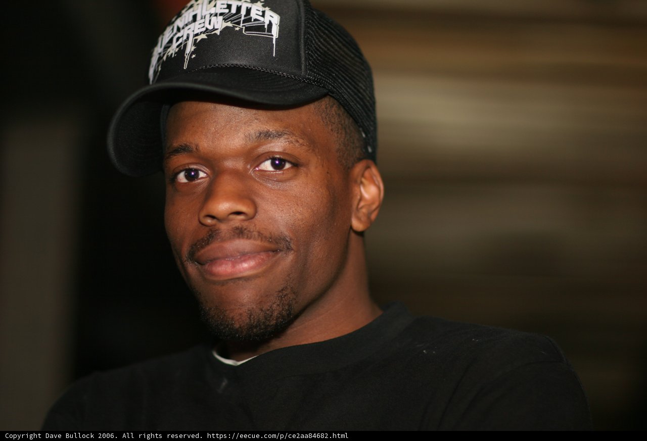 Black Shirt and Baseball Cap