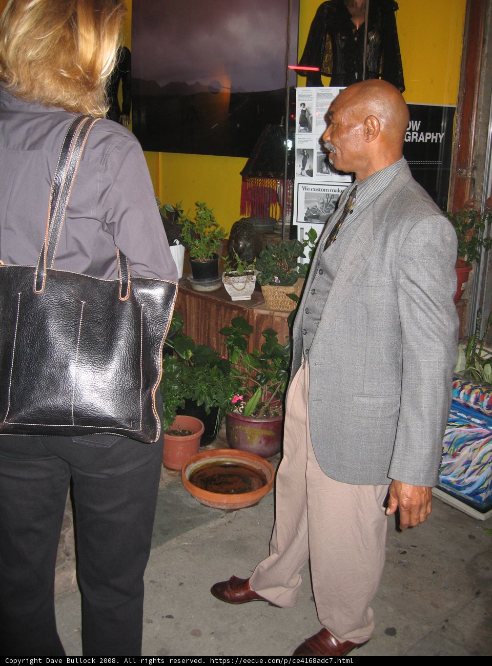 Dapper Gentleman with Stylish Handbag