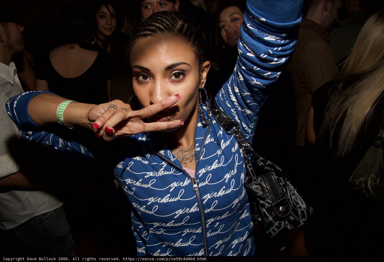 Urban Nightlife with Tattooed Woman