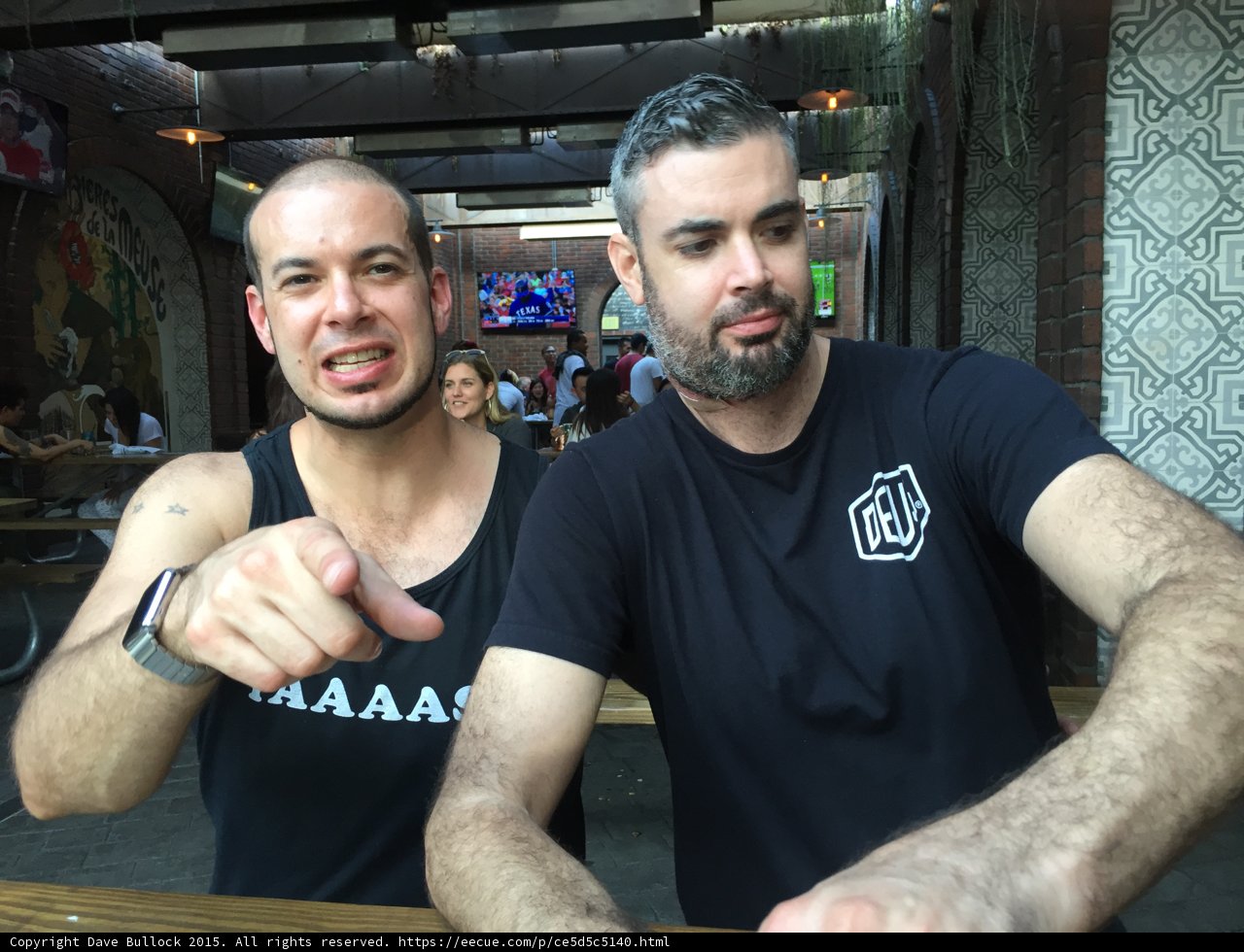 Two Men Enjoying Beers at Long Beach Pub