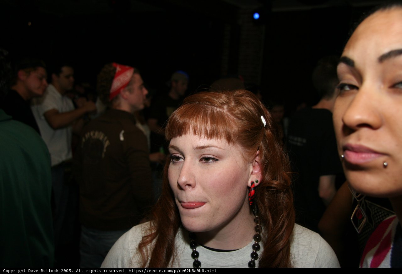 Red-Headed Woman in Urban Nightlife