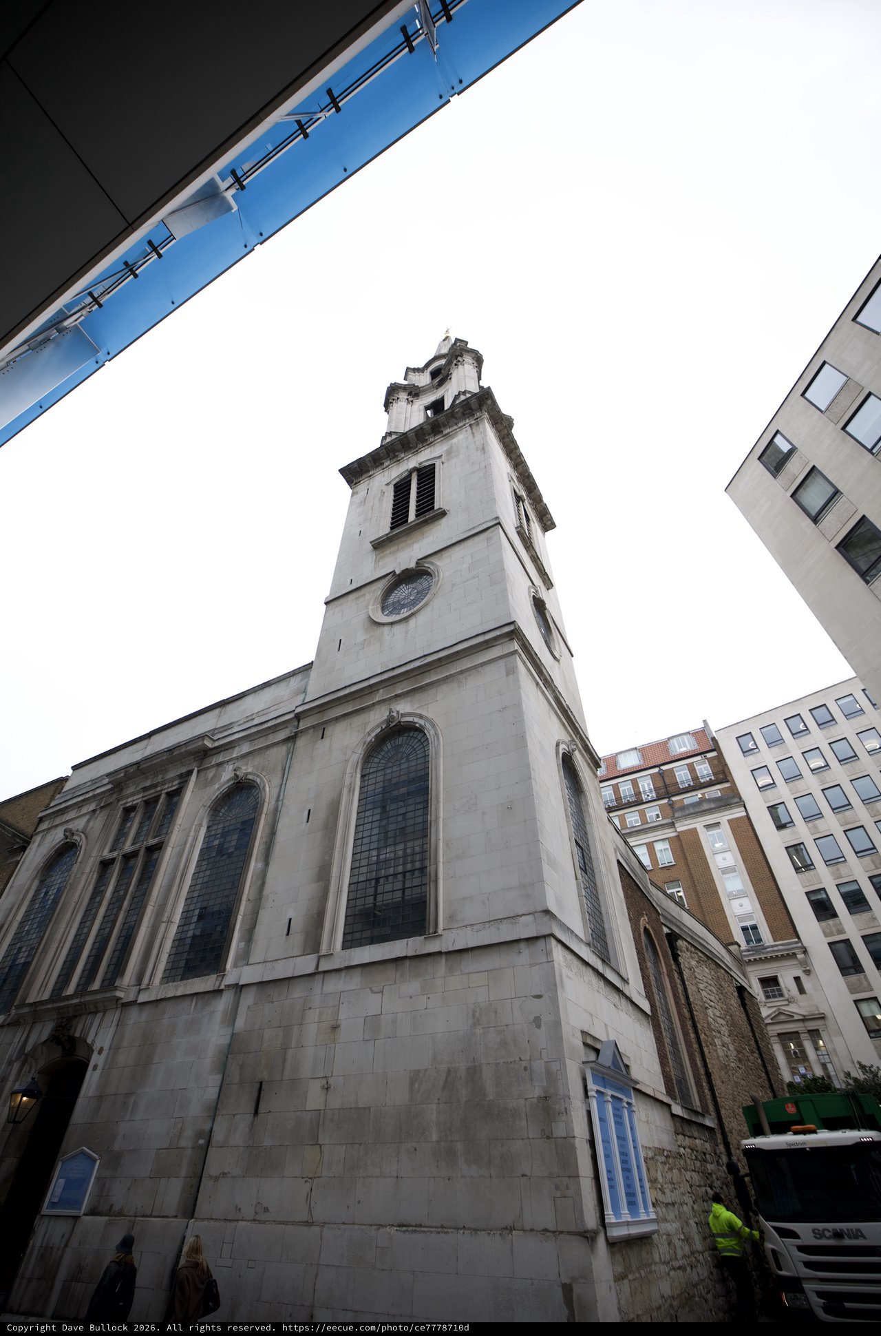 Historic Church Tower Rising Above Modern London Buildings