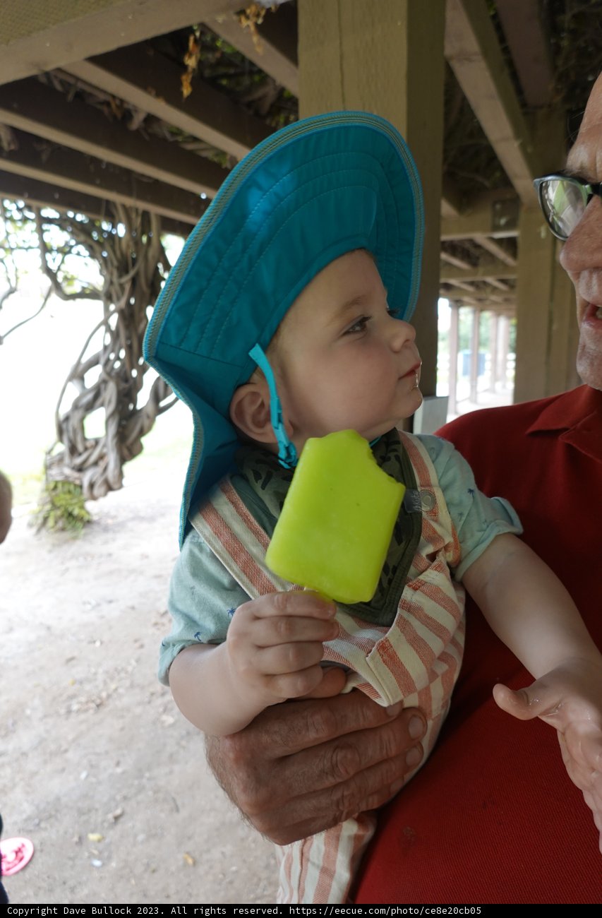Cherubic Laughs under the Blue Cap