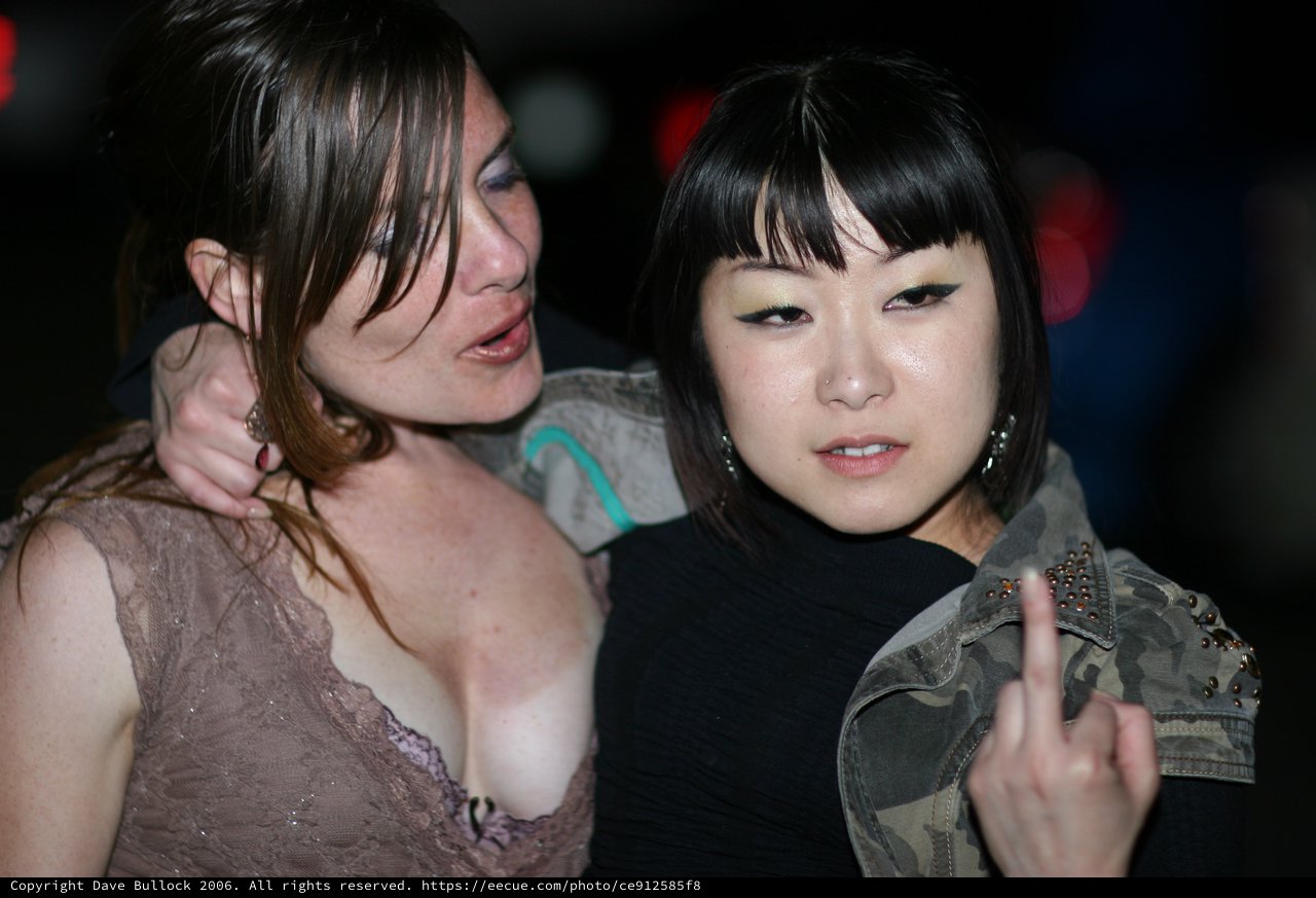 Two Women at Nightclub Miyuki Flips the Bird