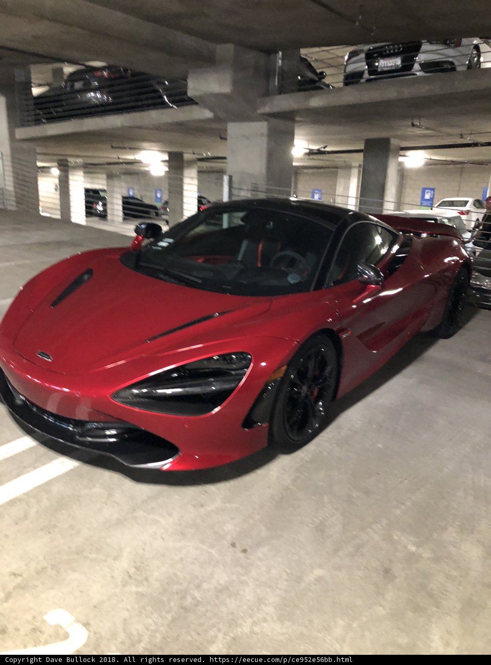 Red McLaren 570S Sports Car in Parking Garage