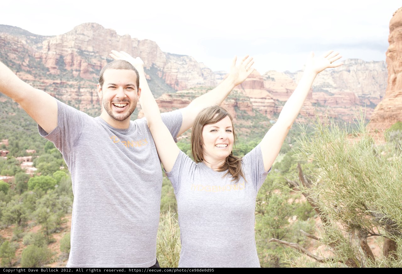Joyful Couple Celebrating Atop Sedona Red Rocks