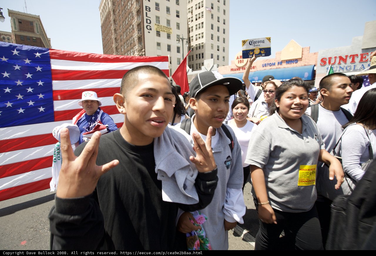 Mayday Rally Participants Wave American Flag