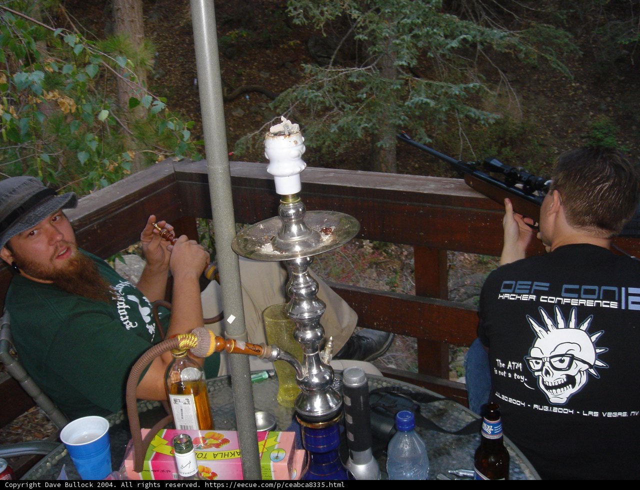 Green Shirted Man Enjoying a Hookah